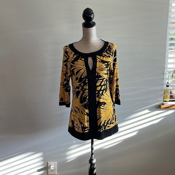 INC size medium yellow and black tunic with keyhole opening in front. - Picture 1 of 4